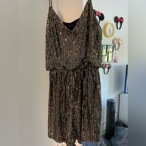 Black and gold romper, brand new!